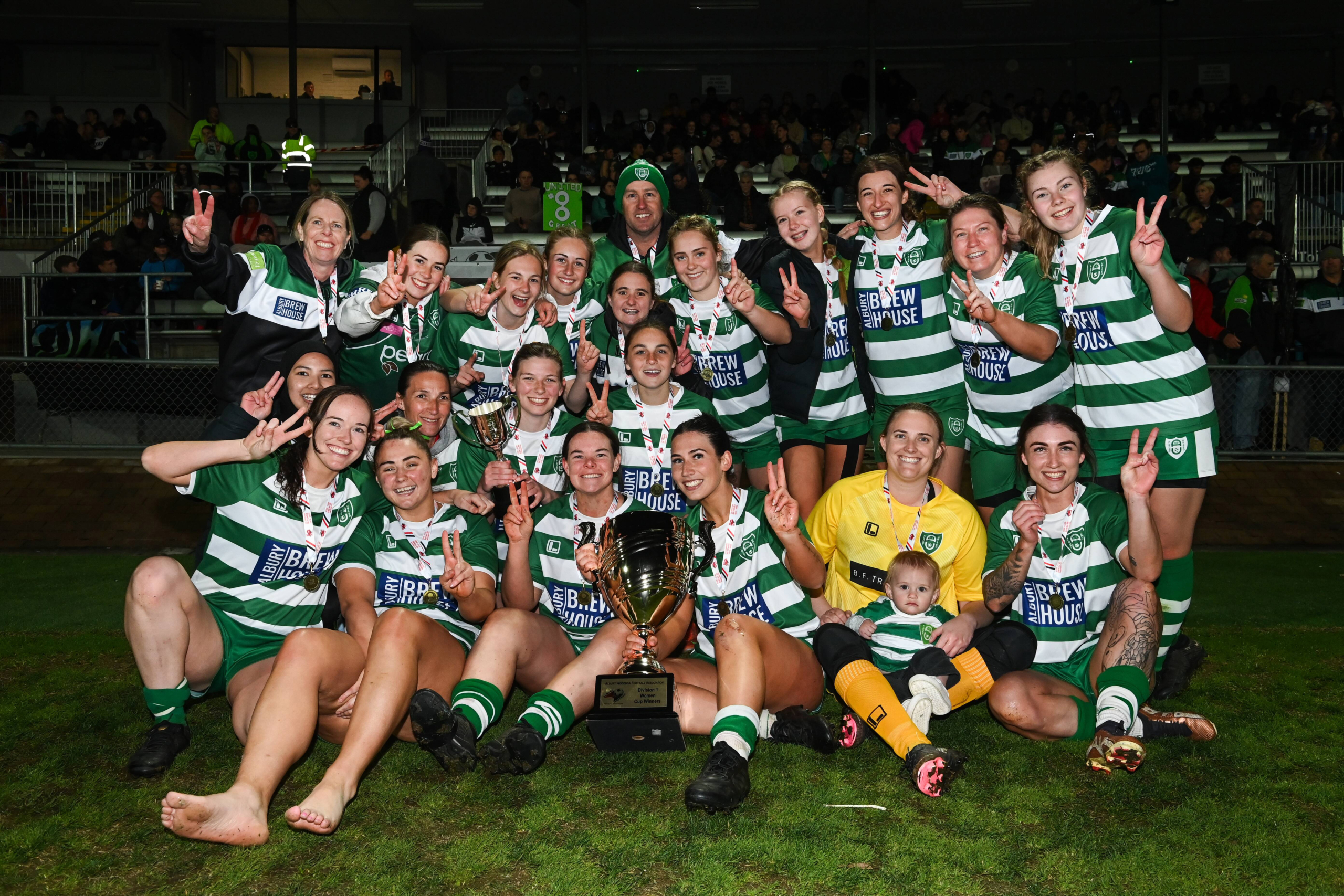 Albury United celebrate with the cup. Picture by Mark Jesser