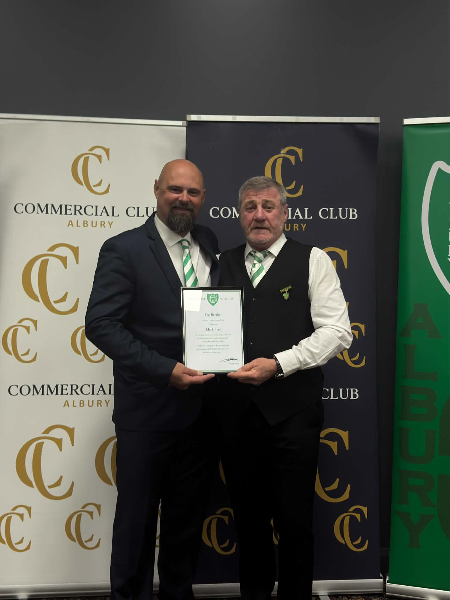 Justin Stevens Presenting Life Member Award to Mark Reed